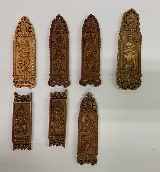 木雕牌飾（暫定名）。國(guó)家文物局供圖