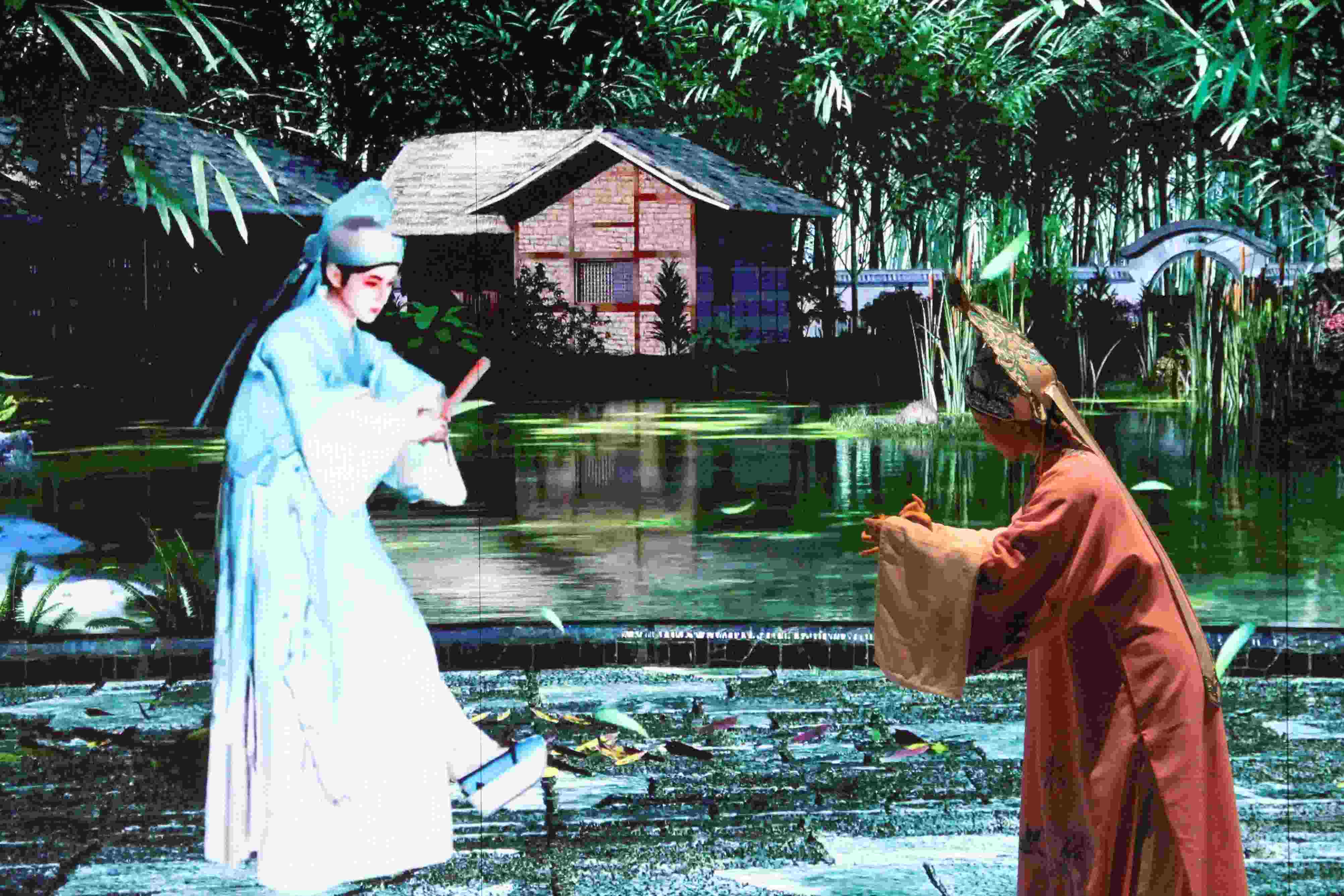 真人演員與虛擬人演員在“元啟金陵”南京數(shù)字文化客廳出演《梁山伯與祝英臺》經典選段。受訪者供圖