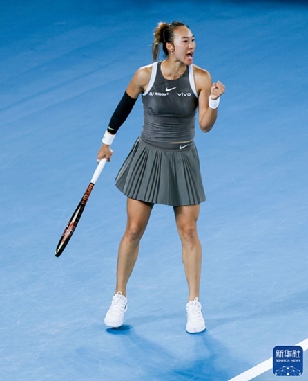 鄭欽文在比賽中慶祝得分。新華社記者 馬平 攝